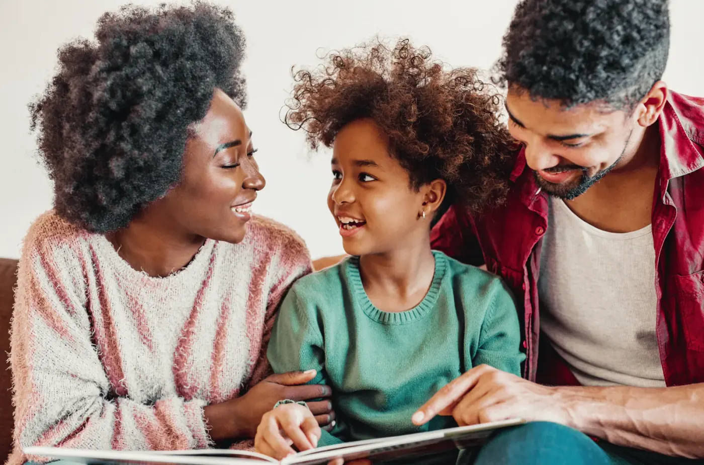 An ABA therapist guiding a young child through a learning activity